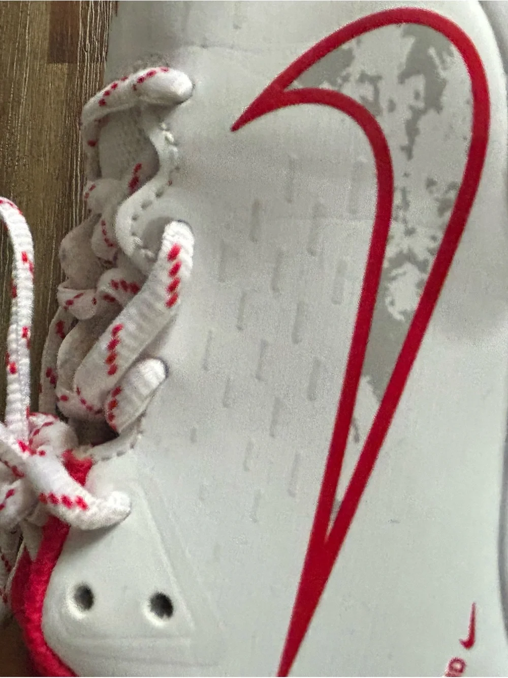 Nike Kids White cleats  with Red and Camo Accents